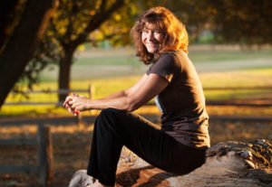 Sonoma County Regional Parks Director Caryl Hart sits for a portrait in Sebastopol's Ragle Ranch Regional Park. (photo by Charlie Gesell)