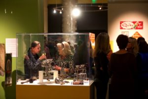 Visitors at the Sonoma Valley Museum toured the Memories: The Kathleen Thompson Hill Culinary Collection exhibit with glasses of wine before a special showing of the movie "Julie and Julia" followed by food from the movie cooked by Sandra Bernstein of The Girl and the Fig. (photo by John Burgess)