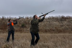 Palmer shoots at a pheasant with chef Dustin Valette, of Dry Creek Kitchen in Healdsburg. (photo by Chris Hardy)