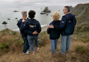 From left: Bob and Delores Allen and Kathy and Chris Cutshall, the parents of Jason Allen and Lindsay Cutshall, on Tuesday visit the bluff overlooking the beach north of Jenner where their children were murdered ten years ago. (Kent Porter, file)