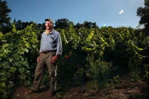 Paul Bernier and his dry farmed grapes. (photos by Chris Hardy)