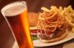 The Quacker, featuring maple leaf ground duck, seasonal chutney, swiss cheese and fried onion rings, is paired with Maibock beer at Bear Republic Brewing Co. in Healdsburg. (photo by Christopher Chung)
