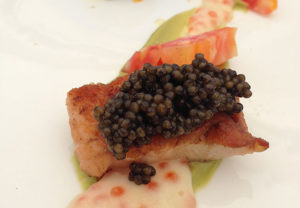 A salmon and roe dish featuring heirloom tomatoes at the 2013 Chef Challenge.