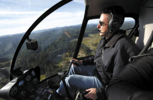 Helico Sonoma chief pilot Daniel King flies over west Sonoma County. (photo by Christopher Chung)