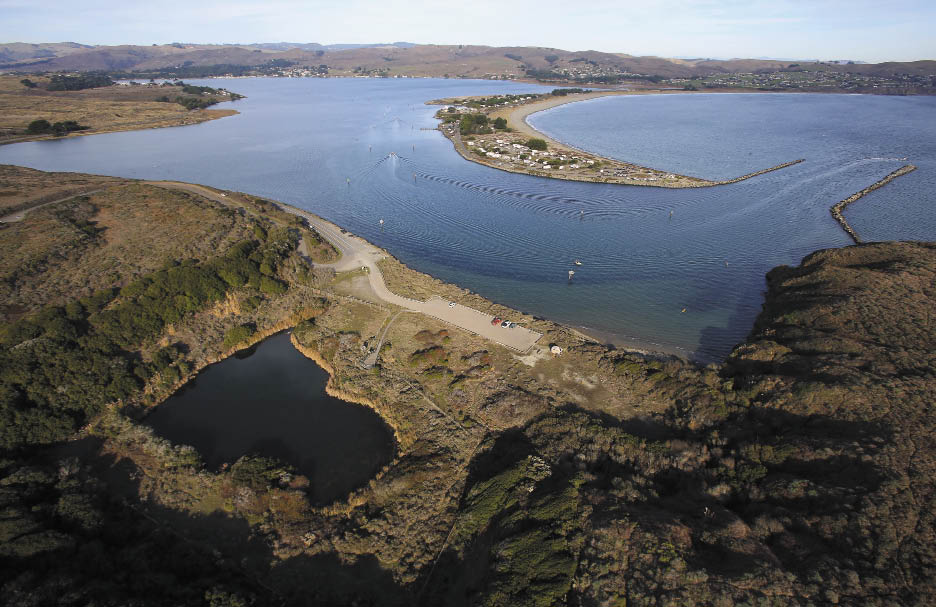 THE HOLE IN THE HEAD, TODAY: A 70-foot deep, water-filled reactor pit is all that remains of PG&E's effort to build a nuclear power plant at Bodega Head. The pit sits directy atop the San Andreas Fault. (photo by Chris Chung)