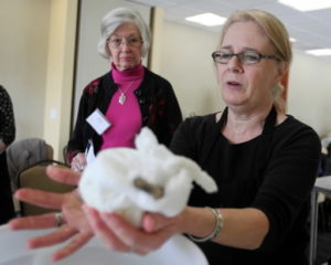 Chef and author Mary Karlin shows Virginia Merwin of Petaluma how to tell when the panir is ready to be put into a cheese mold during the Farm to Table cheese making seminar during the 5th Annual Artisan Cheese Festival held at the Sheraton in Petaluma, Mar. 26, 2011. Panir is a dense, firm cow's milk cheese from India. Crista Jeremiason