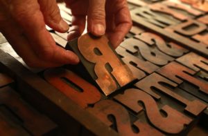 Copper topped wooded type at Iota Press, an authentic letterpress printery, in Sebastopol. (photos by John Burgess)