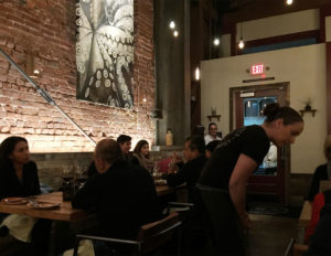 The interior of Ca'Momi Osteria in Napa.