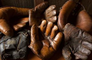 A collection of gloves from a century ago. Fran Fleet, 'The Glove Lady,' has been repairing baseball gloves out of her tiny Cotati shop for over 40 years. (JOHN BURGESS / The Press Democrat)