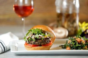 For the Blended Burger Project, Catelli's Chef/Owner Domenica Catelli came up with a burger patty that is a 50-50 mix of house-ground beef and a blend of shiitake, cremini and dried porcini mushrooms, served with her Easy Kale Salad.