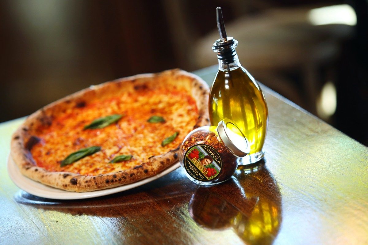 Pizza Luigino is served at the Rustic restaurant at Francis Ford Coppola Winery in Geyserville. (Conner Jay/Sonoma Magazine)