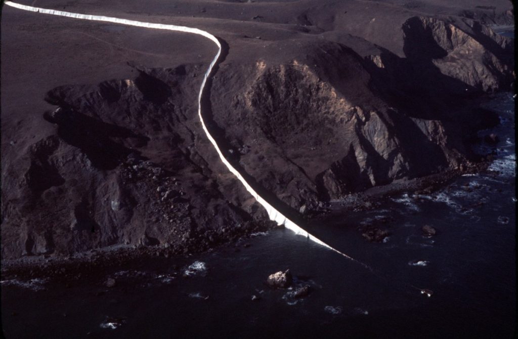 The Running Fence plunges into (or rises out of) the Pacific in Marin County, just a short distance south of the Estero Americano, which is the boundary between Marin and Sonoma counties. Color photo by John LeBaron. 