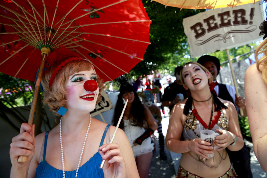 6/9/2014:B1: Katrina Kroetch, left, and Bramani Quinn take part in a parade during the Lagunitas Beer Circus on Sunday in Petaluma. PC: Katrina Kroetch, left, and Bramani Quinn, take part in a parade during the Lagunitas Beer Circus on Sunday, June 8, 2014 in Petaluma, California. (BETH SCHLANKER/ The Press Democrat)