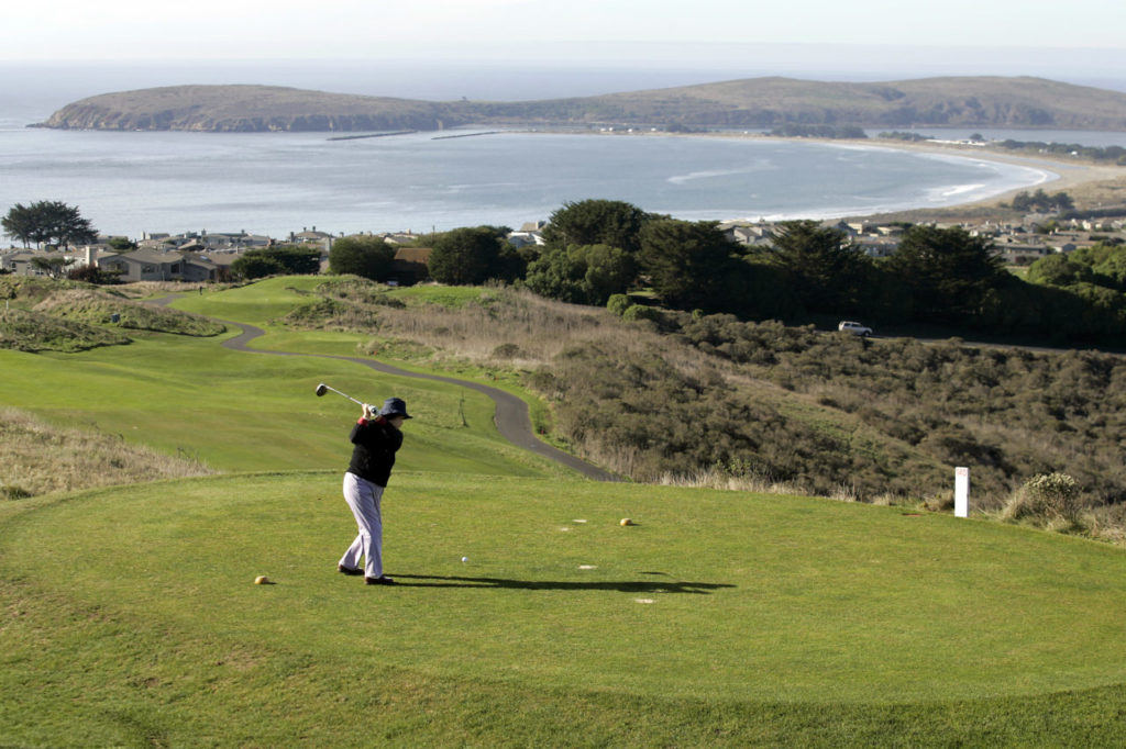 12/28/2008: B7: The Links at Bodega Harbour overlooking Bodega Bay 12/12/2008:A1: Sandra Kim prepares to drive the ball from the fifth tee at The Links at Bodega Harbour golf course overlooking the town of Bodega Bay and Doran Beach on Thursday. The community was recently named one of the 32 most expensive small towns in America. PC: Sandra Kim prepares to drive the ball off of the fifth tee at The Links at Bodega Harbour golf course overlooking the town of Bodega Bay and Doran Beach on Thursday, December 11, 2008.