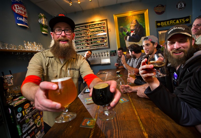 Bartender Nate Hanes serves up the best beers the Fenn brothers can find at Beer Craft in Rohnert Park. (Photo by John Burgess)