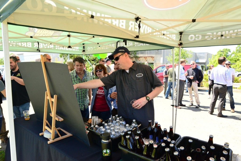 Vinnie Cilurzo, Russian River Brewing Company owner and brew master, shows friends what the new brewery in Windsor will look like. (Photo Tim Vallery)