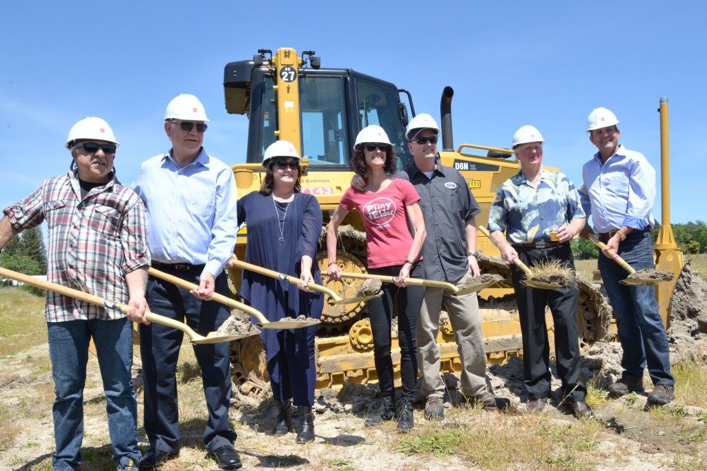 From left: Windsor council member Mark Millan, Windsor council member Bruce Okrepkie, Windsor Mayor Debora Fudge, Natalie and Vinnie Cilurzo, Windsor council member Sam Salmon and assembly member Jim Wood, break ground at the site of the new Russian River Brewing Company facility in Windsor. (Photo Tim Vallery)