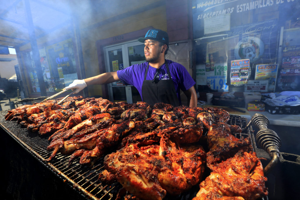 Jose Ojeda grills 400 chickens per weekend at El Brinquito Market & Meat in Sonoma. (JOHN BURGESS / The Press Democrat)