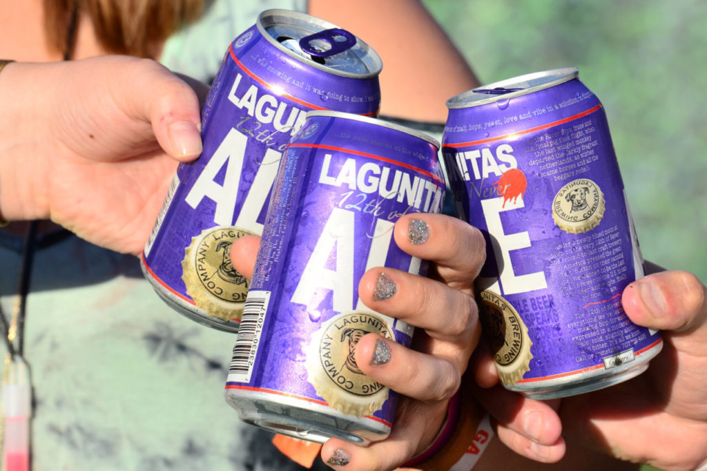 Friends toast with Lagunitas' The 12th of Never Ale at BottleRock Napa Valley. (Tim Vallery) 