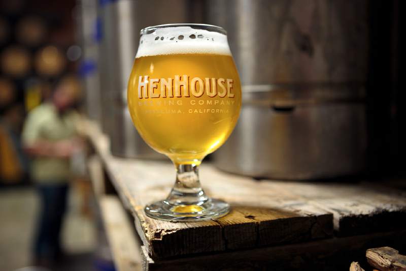 Glass of HenHouse Brewing Saison beer