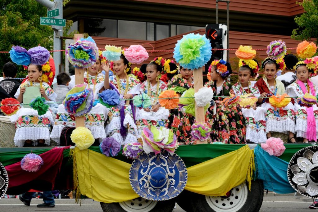 Members of Ballet Folklorico Netzahualcoyotl turning onto E Stree during the 122nd annual Luther Burbank Rose Parade & Festival held in downtown Santa Rosa Saturday, May 21, 2016. (Photo: Erik Castro/for The Press Democrat)