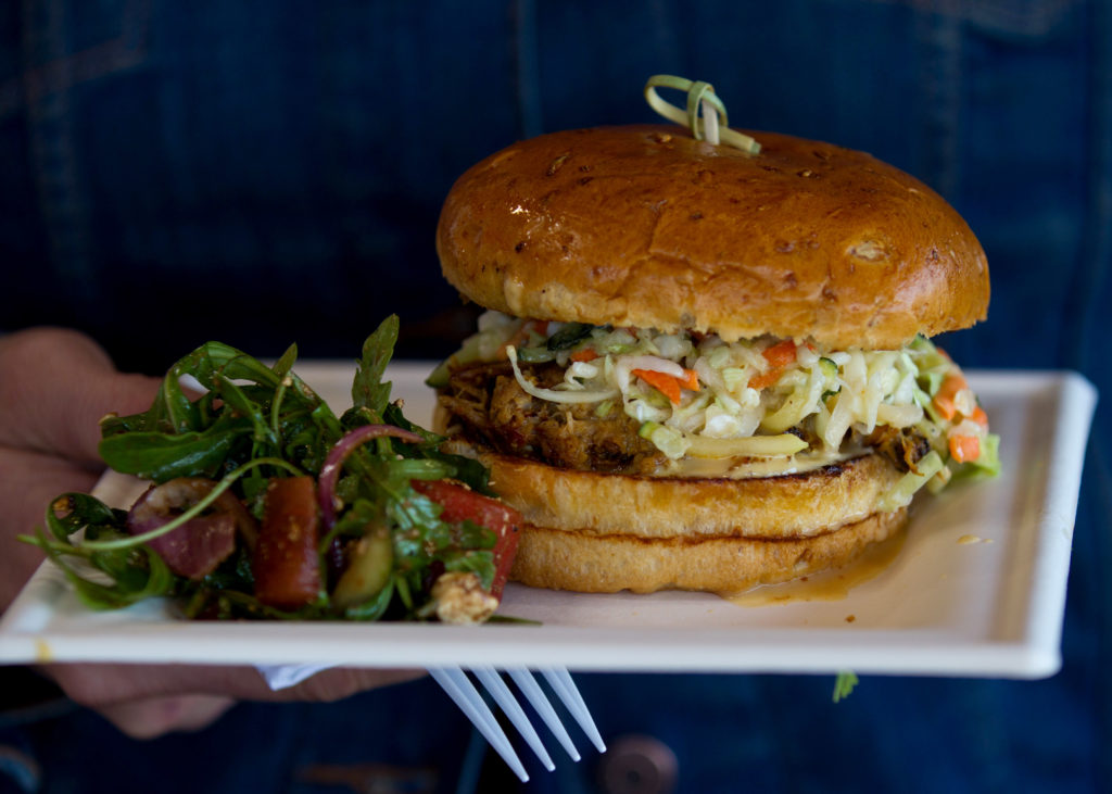 A BBQ pork sandwich from the "Foodie Farmhouse" food truck during the Puppies and Pinot fundraiser for Sonoma Humane Society held at Pellegrini Wine Co., in Santa Rosa, Calif., on Saturday, May 27, 2017. (Photo by Darryl Bush / For The Press Democrat)