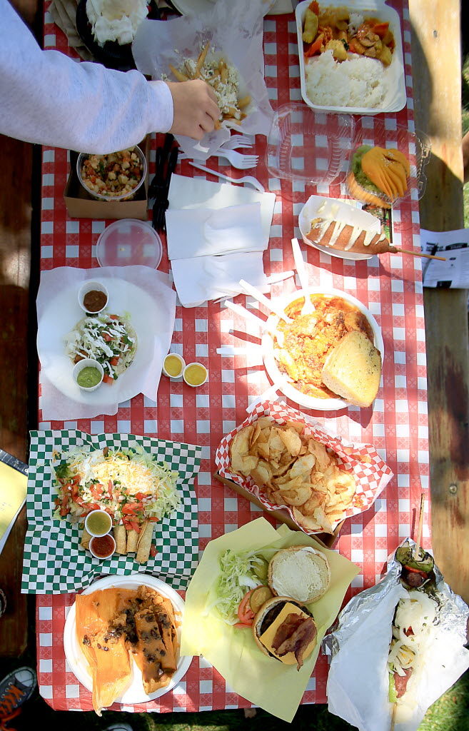A table full of fair food at the Sonoma County Fair, Friday July 24, 2015 in Santa Rosa. (Kent Porter / Press Democrat) 