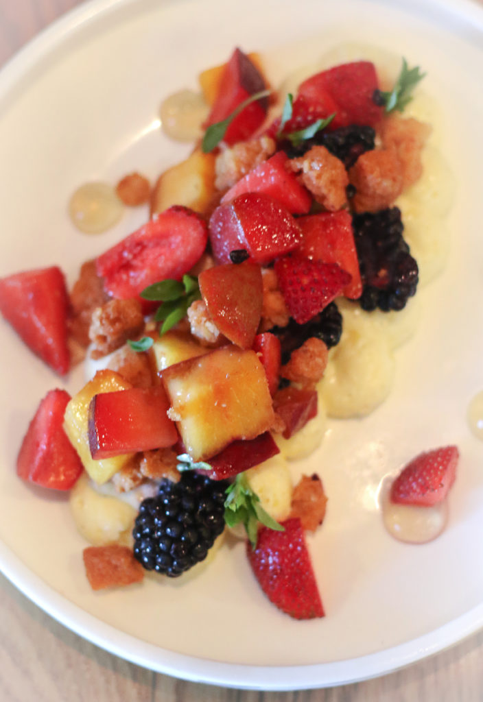 Deconstructed fromage blanc cheesecake with summer fruit panzanella, golden balsamic, brioche crouton, Greek basil at the Brass Rabbit in Healdsburg. Heather Irwin/PD.