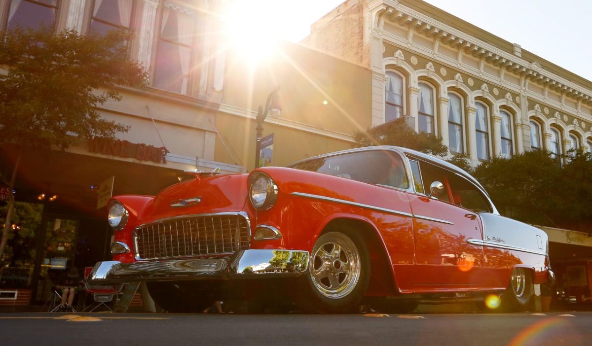 A motorist cruises by in a Chevrolet Bel Air during the Salute to American Graffiti in Petaluma, California on Saturday, May 20, 2017. (Alvin Jornada / The Press Democrat)