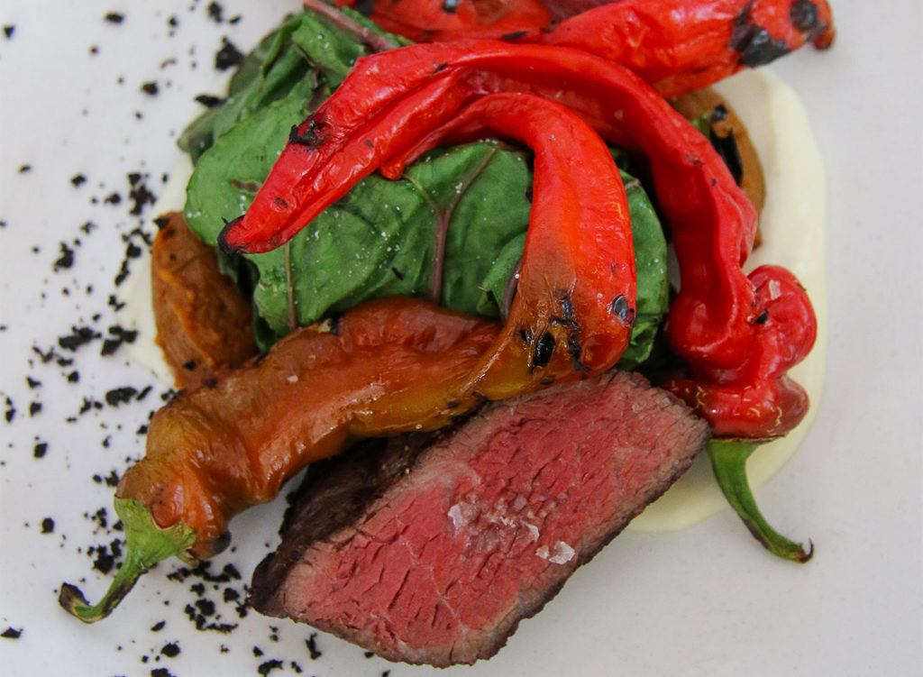 Grilled akuashi coulotte with blue cheese mousseline, piperade, Jimmy Nardello peppers, chard, black oive crumble at Russian River Vineyards restaurant in Forestville. Heather Irwin/PD