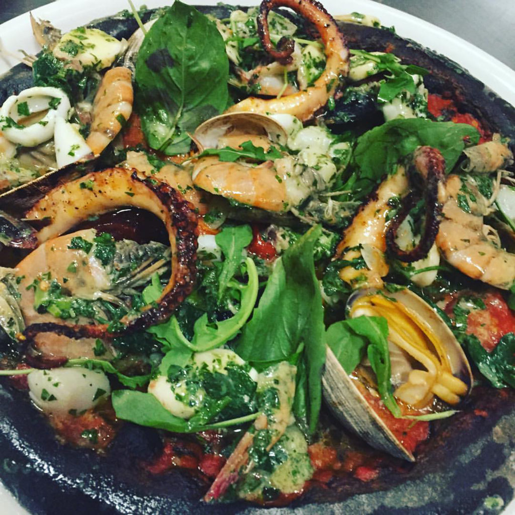 HEATHER IRWIN / The Press Democrat Davy Jones Locker pizza at Diavola in Geyserville is a seafood extravaganza.