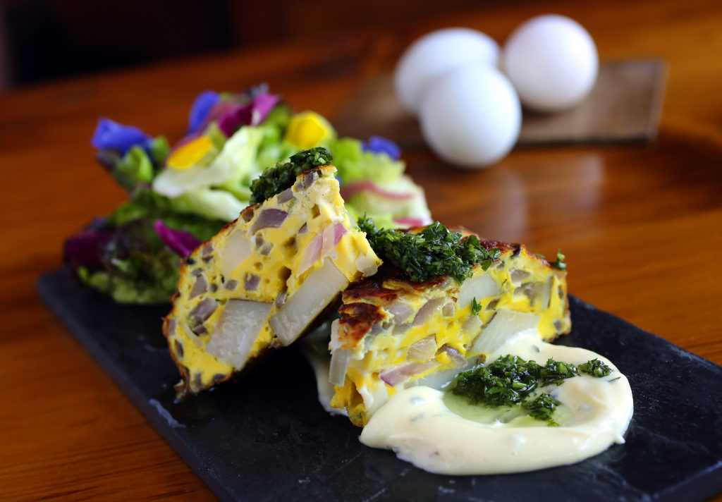 Spanish Tortilla Espanola with onions, potatoes, leeks, garlic, duck eggs and fresh herb aioli (also made with duck eggs) from chef Daniel Kedan at Backyard in Forestville. (John Burgess/The Press Democrat)