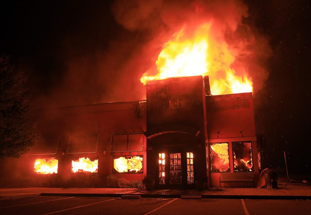 The Applebees on Cleveland Avenue in Santa Rosa set ablaze by the Tubbs fire. (Kent Porter)