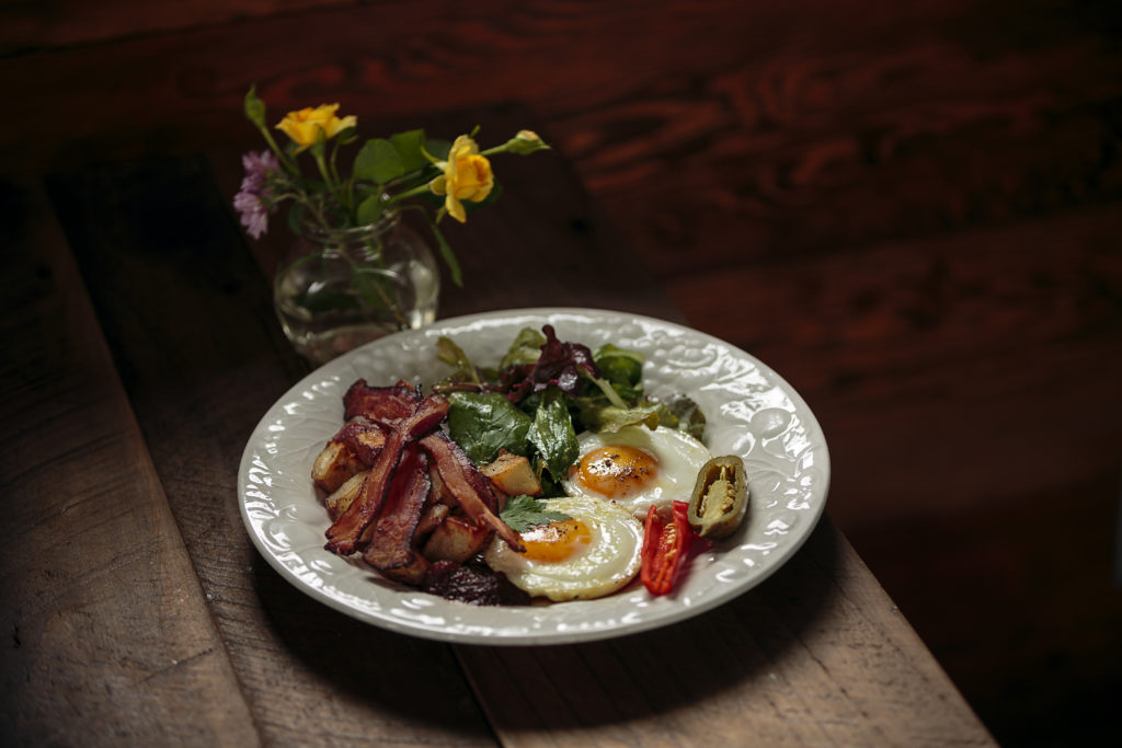 Naked Pig restaurant for story on breakfasts and owners Jason Sakach and Dalia Martinez The Americana breakfast with eggs, ham and jalapeos