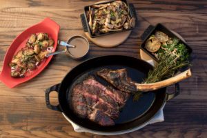 21-Day Dry Aged Bone-On Tomahawk for Two ($130) with Hen of the Wood Mushrooms ($12) and Charred Broccolini ($