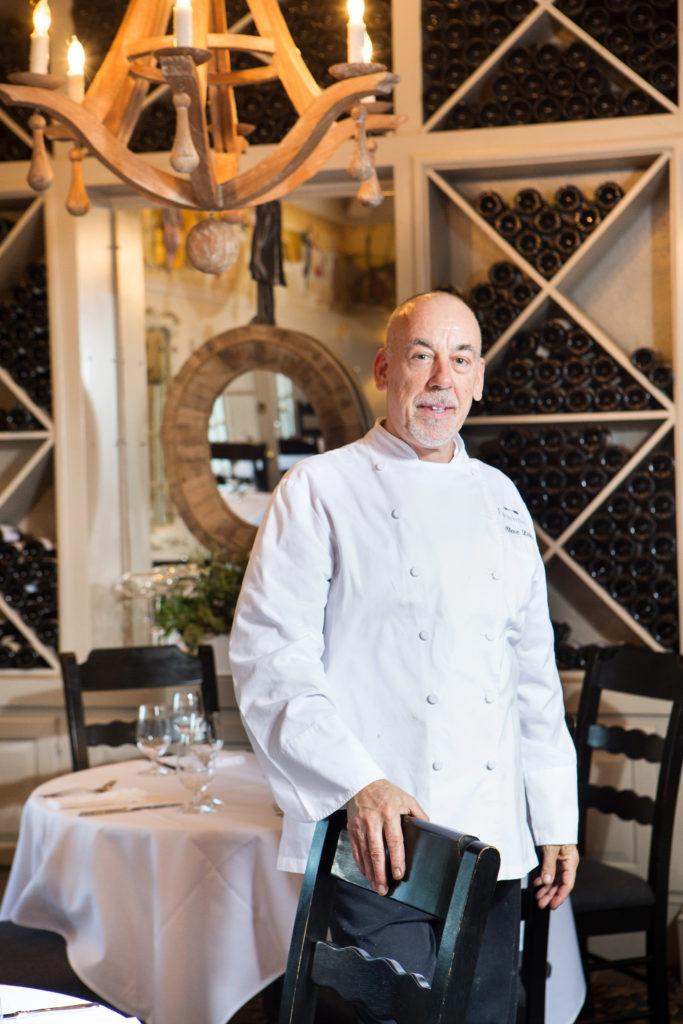 Farmhouse Inn chef Steve Litke stands in the dining room of his Michelin star-ranked restaurant. Farmhouse is now ranked by Travel and Leisure Magazine as the fourth best inn in America, and is number 28 on its WorldÕs Best Hotels list. Shot on Friday, February 20, 2015 at Farmhouse Inn in Forestville, Calif. (Photo by Charlie Gesell for the Sonoma magazine)