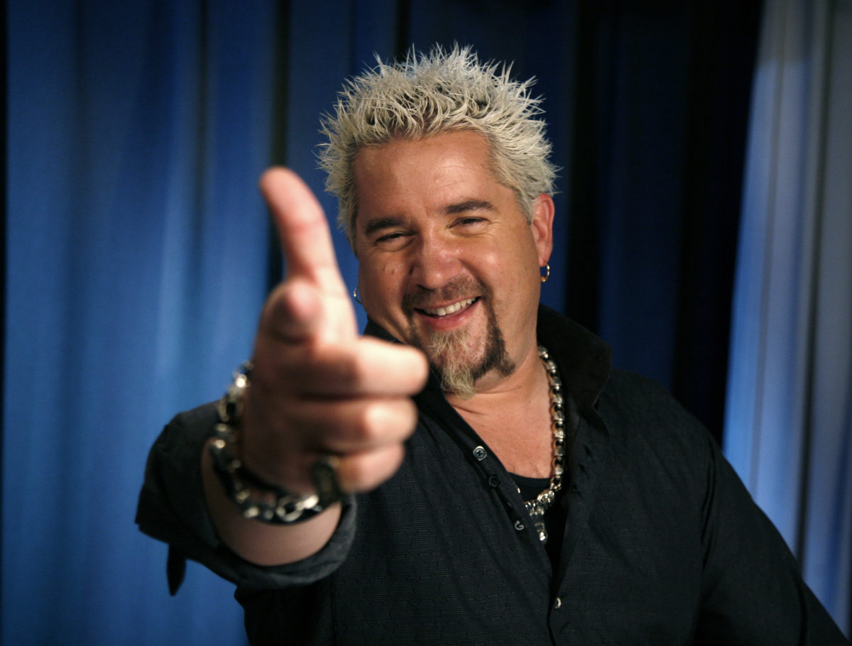 TV personality Guy Fieri poses for a portrait Wednesday, May 4, 2011 in New York. (AP Photo/Jeff Christensen)
