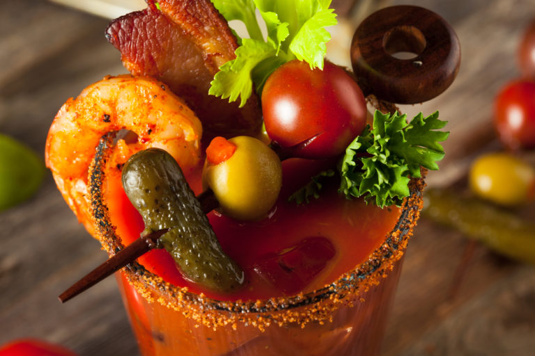 Homemade Bacon Spicy Vodka Bloody Mary with Tomatos, Olive and Celery. (Brent Hofacker / Shutterstock)