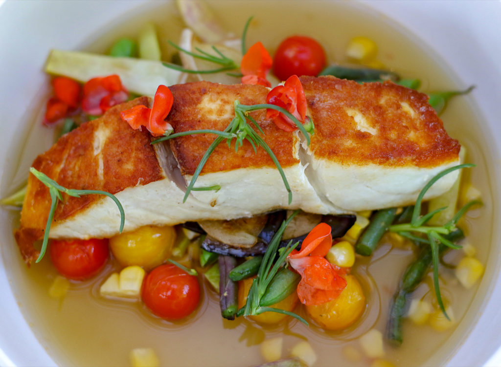 San Francisco Bay Halibut with estate beans, cherry tomato, eggplant, roasted corn broth at Russian River Vineyards restaurant. Heather Irwin/PD