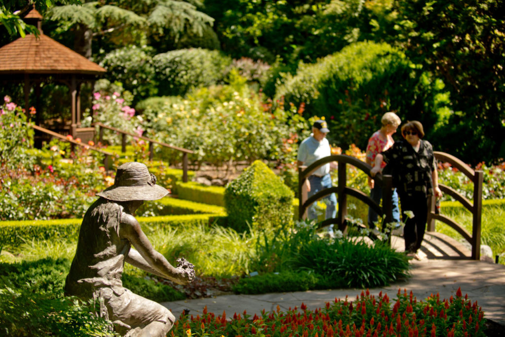 Visitors walk through the flower garden at Ferrari-Carano Vineyards and Winery in Healdsburg, Calif., on June 22, 2013. (Alvin Jornada for The Press Democrat)