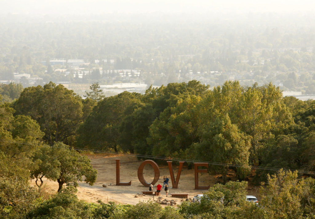 Visitors explore the sculpture garden at Paradise Ridge Winery in Santa Rosa, California, on Wednesday, August 9, 2017. (Alvin Jornada / The Press Democrat)