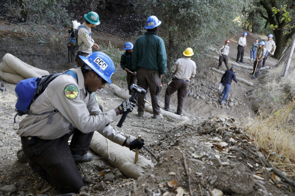 Allen Smith and other members of the Napa California Conservation Corps install wattles to combat erosion near a creek at Shiloh Ranch Regional Park in Windsor, on Wednesday, November 1, 2017. (BETH SCHLANKER/ The Press Democrat)