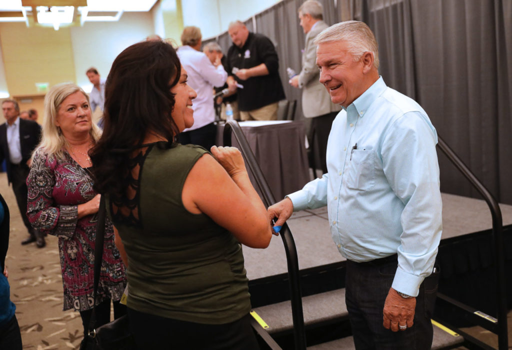 Former FEMA director James Lee Witt, right, speaks with Julianna Gudino after the Rebuild NorthBay community meeting at SSU, in Rohnert Park on Wednesday, October 25, 2017. (Photo by Christopher Chung)
