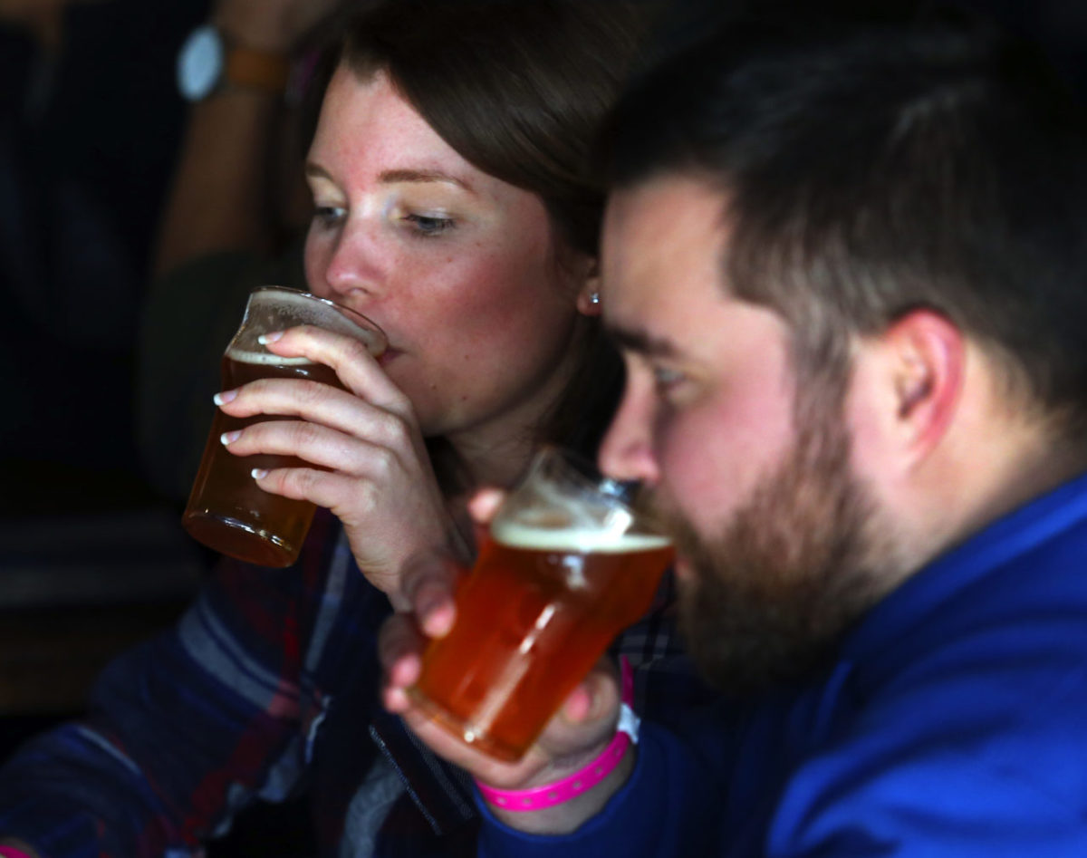 Beer lovers from around the world stood in line for their chance to taste Pliny the Younger at Russian River Brewing Company in Santa Rosa on Friday. (JOHN BURGESS / The Press Democrat)