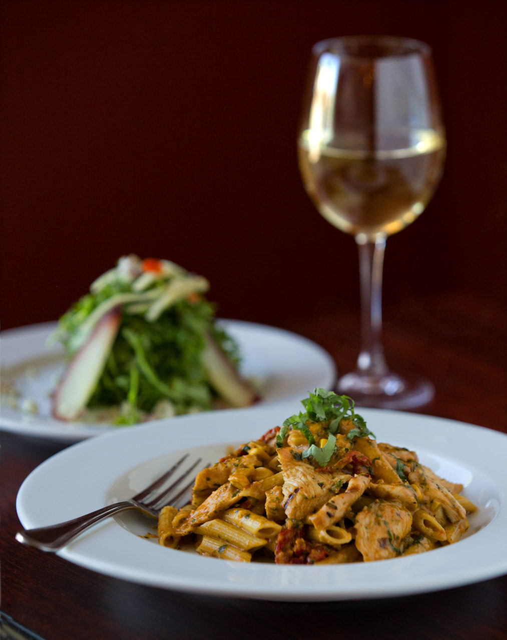 The lunch special includes Penne with chicken and an arugula salad and a scoop of gelato from Alfredo's Italian Restaurant in Petaluma. (photo by John Burgess/The Press Democrat)