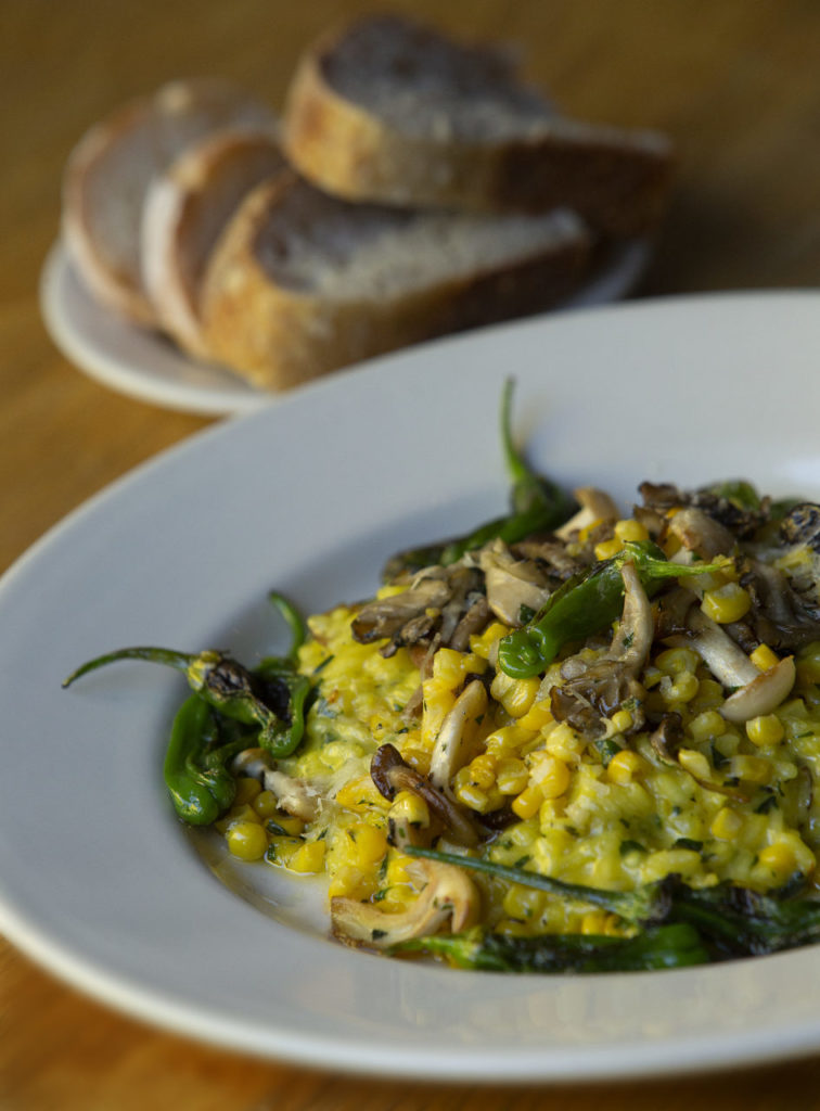 Saffron risotto with local corn, mushrooms and shishito peppers from the Harvest Moon Cafe on the square in Sonoma. (photo by John Burgess/The Press Democrat)