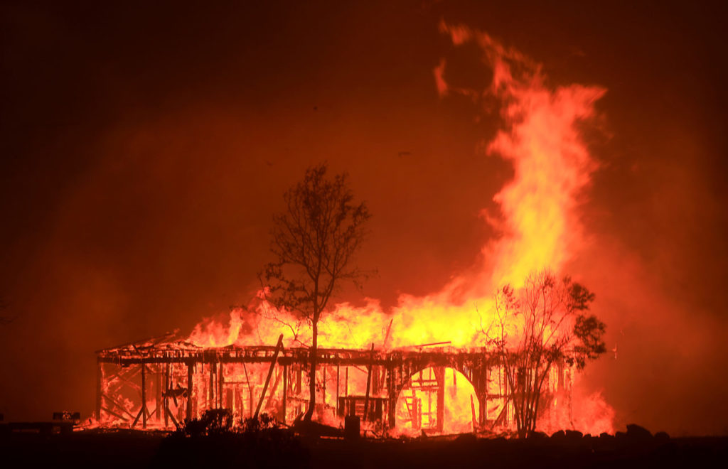 The Historic Round Barn burns in Santa Rosa, Monday Oct. 9, 2017. (Kent Porter / Press Democrat) 2017