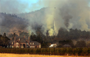 Helicopters drop water on a fire on the flanks of Hood Mountain above Leson Winery in the Sonoma Valley on October 14, 2017. (Photo by John Burgess)