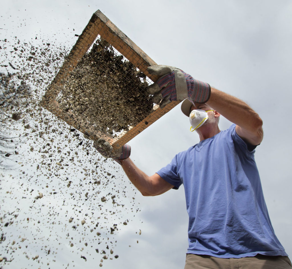 Residents used mesh sifters in the hopes to find treasure among the ash of their burned out homes in the Coffey Park neighborhood of Santa Rosa. (Photo by John Burgess)