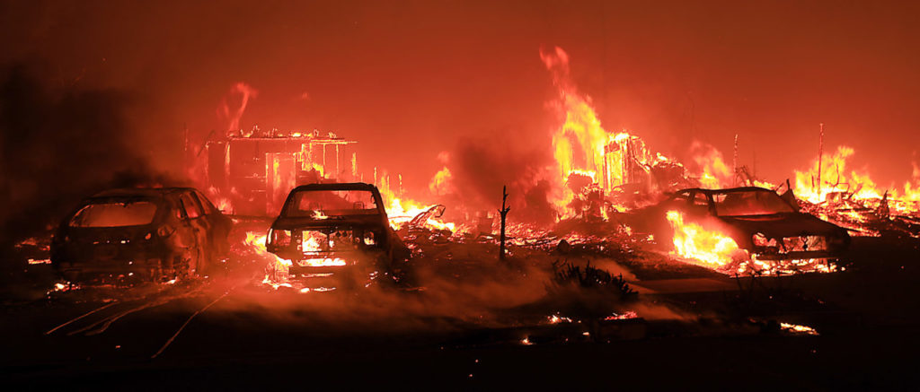 Homes burn in Kenwood early Monday Oct. 9, 2017. (Photo by Kent Porter)